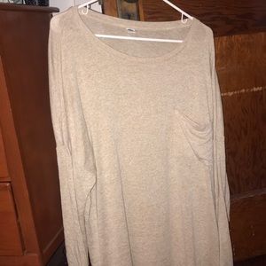 Long sleeve gold shirt.